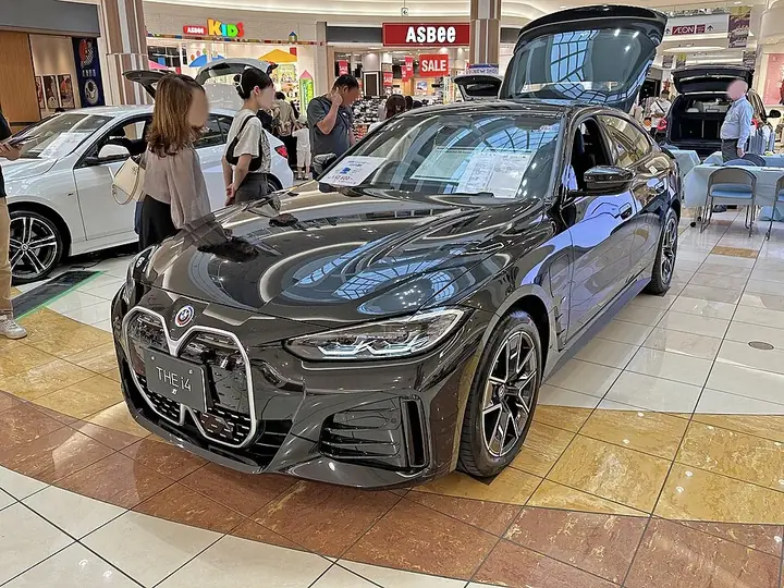 BMW i4 — representative model photograph; exact trim and UK specification may differ